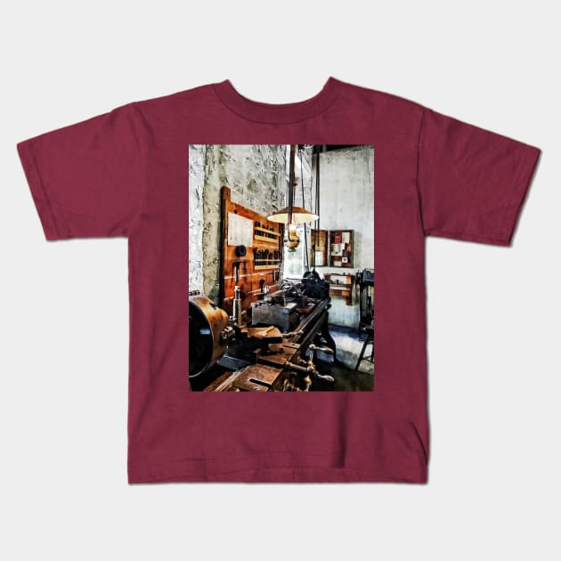 Machinists - Small Lathe in Machine Shop Kids T-Shirt by SusanSavad